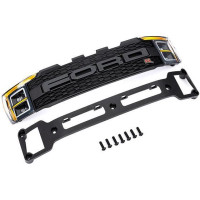 Cserealkatrész a Traxxas Ford Raptor R 4WD-hez - első hűtőrács konzollal, összeszerelve, fényparabolákkal és 3x10mm BCS rögzítőcsavarokkal (7).