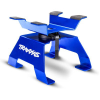 Traxxas állvány kiváló minőségű eloxált alumíniumból készült. Alkalmas 1:10 és 1:8 méretarányú modellautókhoz. Használható 1:18-as és 1:16-os autómodellekhez is, ha opcionális habbetéteket használunk. 360°-ban forog két golyóscsapágyon, és tartalmaz egy kart, amellyel a 16 pozíció egyikében rögzíthető a forgás.