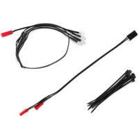 Traxxas LED-es fényszóró világítás Traxxas Ford Raptor R. Emeld a részletesség szintjét és élvezd az esti autózást ezzel a négy fényszóró LED-et, tápkábelt és rögzítő pántokat tartalmazó készlettel.