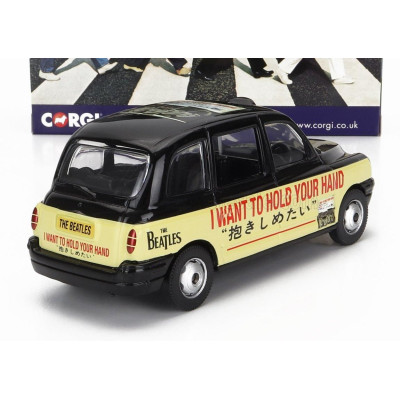 CORGI AUSTIN LONDON TAXI LTI TX4 2007 - THE BEATLES - I WANT TO HOLD YOUR HAND - YELLOW BLACK 1/36