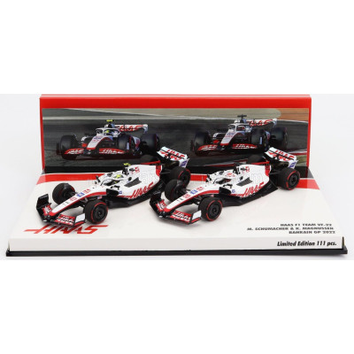 MINICHAMPS HAAS F1  SET 2X VF-22 FERRARI TEAM HAAS N 20 5th BAHRAIN GP 2022 KEVIN MAGNUSSEN + N 47 BAHRAIN GP 2022 MICK SCHUMACH