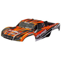 Traxxas Slash 4X4 karosszéria narancssárga. Festett, összeszerelt karosszéria, beleértve a rugó nélküli rögzítő konzolt is. A #6940-es számú alkatrész (Slash 2WD), vagy a #6976-os és #10125-ös számú alkatrészek (Slash 4x4) szükségesek a régebbi Slash alvázakhoz, amelyek a karosszéria kapcsos rögzítési rendszerével rendelkeznek.
