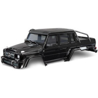 Traxxas Mercedes-Benz G 63 karosszéria fekete (klipszmentes). Komplett, színes. Beleértve az első hűtőrácsot, az oldalsó tükröket, az ajtókilincseket, egyéb részleteket és a rögzítőrendszert. #8080X és #8828X kerékjárati ívekre való felszerelésre szánták.