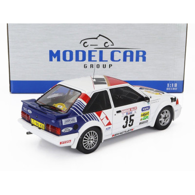 MCG FORD ENGLAND ESCORT MKIII RS TURBO N 35 RALLY HUNSRUCK 1985 STIG ANDERVANG - ANDRE SCHOONENWOLF - WHITE RED BLUE 1/18