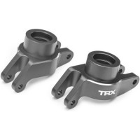 A Traxxas első blokkja rendkívül ellenálló 6061-T6 alumíniumból készült, CNC-n precízen megmunkálva a geometria megőrzése érdekében, szürke eloxálva a modell lenyűgöző megjelenése érdekében. Pár (bal és jobb).