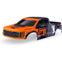 Komplett Traxxas Ford Raptor R Fox narancssárga karosszéria. Tartalmazza a hűtőrácsot, a csomagtartó hátsó paneljét, az oldalsó tükröket, az ablakmaszkot és a matricát. Traxxas clipless rögzítőrendszerre - TRA10124 és TRA10125 - tervezve. Nem Slash modellekhez való.