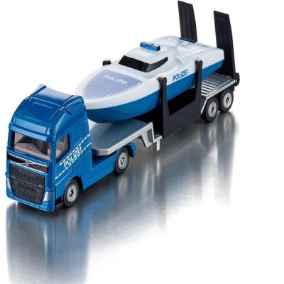 SIKU Super - tahač Volvo s člunem 1:87