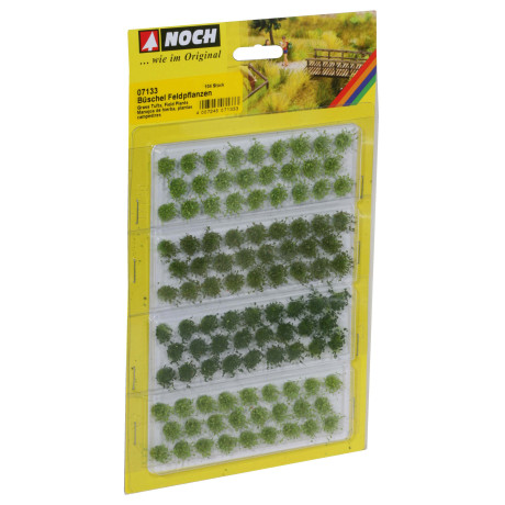 Trávové trsy  polní rostliny zelené odstíny, výška 6 mm