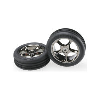 Komplett első kerekek Traxxas Bandit autókhoz. Fekete krómozott kerekek bordázott gumiabroncsokkal. Kerékméret ø60x25mm, teljes méret ø83x29 mm. A hordozó tengely egy csapszeggel ellátott tengely. Offset 15 mm. A gumiabroncs keverék keménysége közepes.