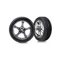 Komplett első kerekek Traxxas Bandit autókhoz. Krómozott kerekek bordázott gumiabroncsokkal. Kerékméret ø60x25mm, teljes méret ø83x29 mm. A hordozó tengely egy csapszeggel ellátott tengely. Offset 15 mm. A gumiabroncs keverék keménysége lágy.